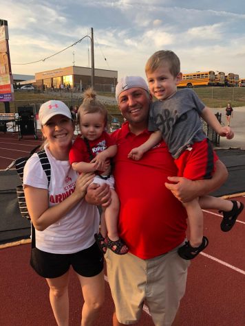Coach Andy Endress with his wife and two kids
