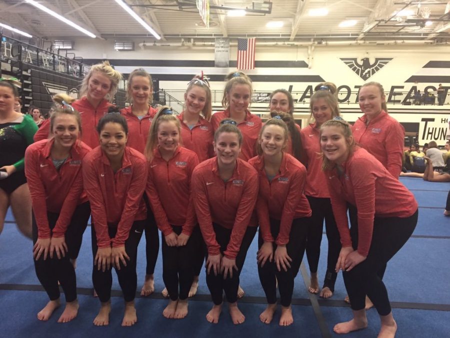Team poses after final match of the 2018-2019 season at districts (via @KHSgymnasts on Twitter)
