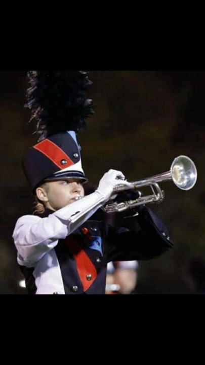 Laina Jones performing in band, photo by Kari Ball
