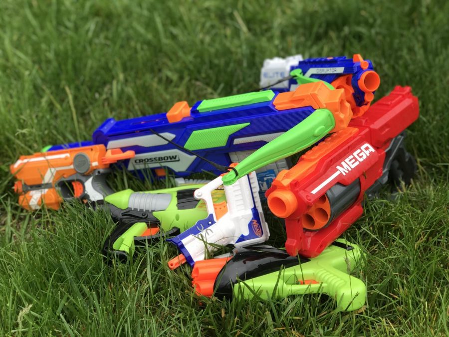 Students choose from a variety of Nerf gun styles to compete in the annual dart wars competition. 