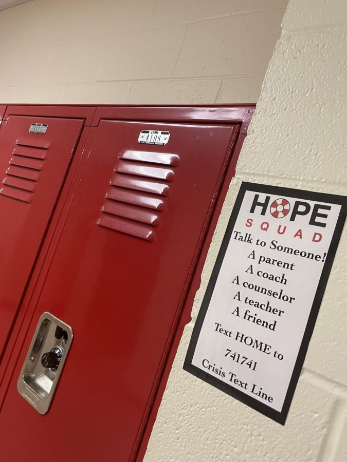 The Hope Squad posts encouraging flyers around the school to remind students to care for their mental health
