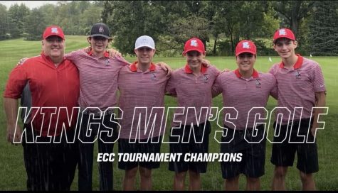 The men’s golf team lined up by the practice green getting ready for the ECC championships. 