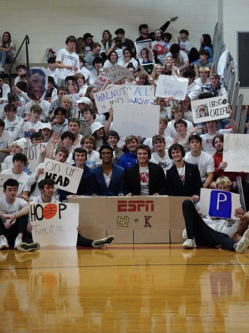  ESPN night commentators (from left to right: Thomas Boster, RJ Jackson, Noah Spencer, and Michael Sarchet) 
        Sit at the desk with the red sea behind them on ESPN night. 1/21/22 