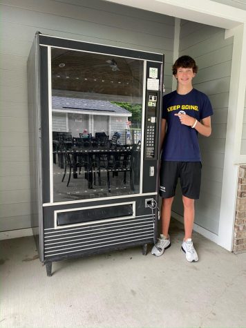 Colin Shultz showcases his first vending machine at Woodfield Pool
