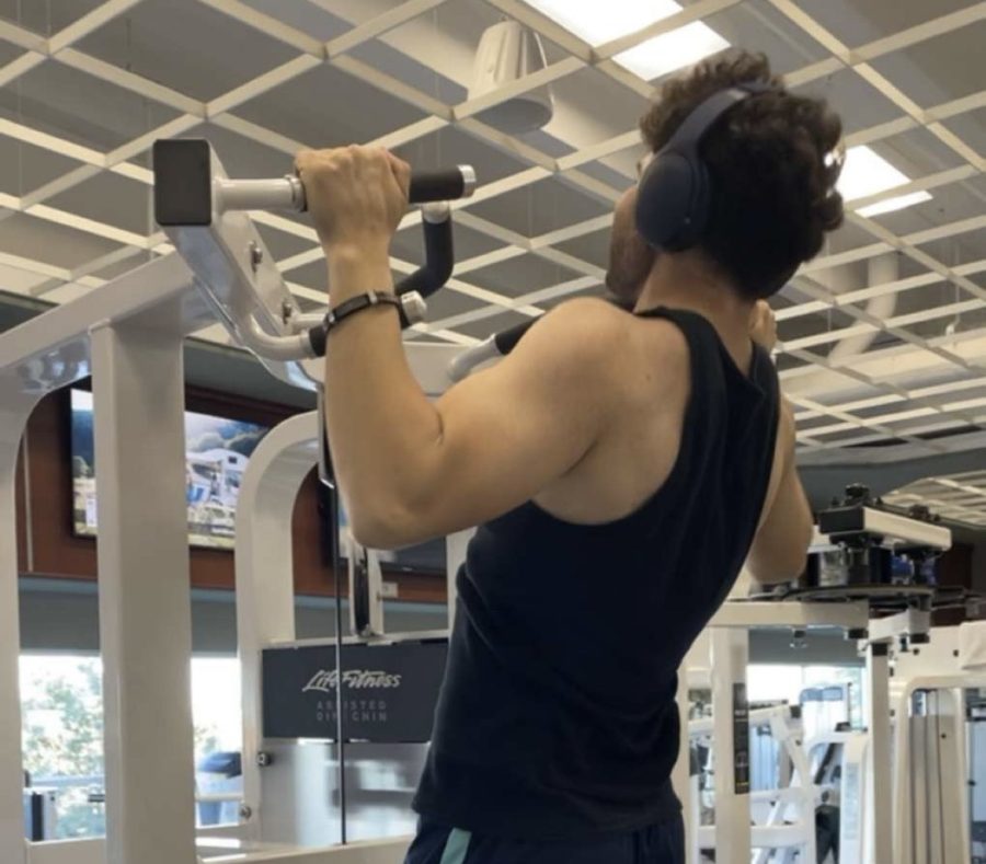 Narek Gasparyan does pull ups to work on arm strength.