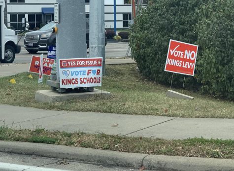 Two opposing levy campaign signs posted alongside each other on State Route 22 and 3 in Landen show voters interests in the upcoming ballot measure.