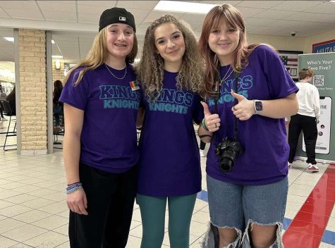  Mack Lafferty (left), Mia McFaline (middle) Logan Rankin (right) spread awareness for The 988 Initiative, selling t-shirts at the Kings vs. Loveland basketball game.
