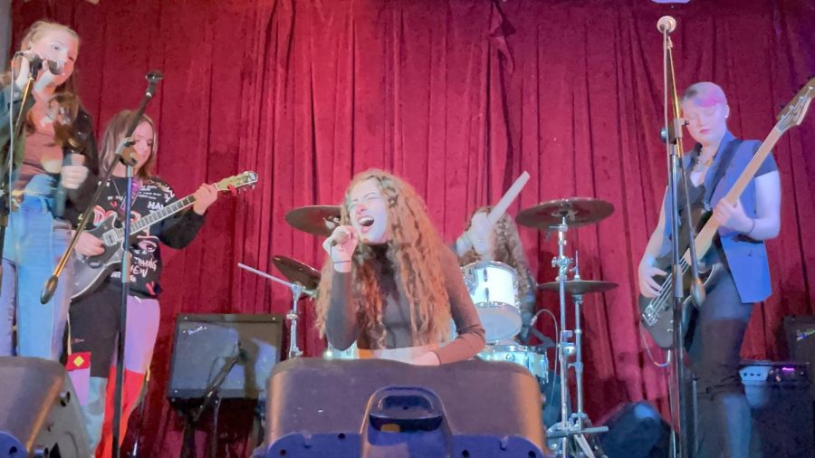 Bell Cantrall mesmerizes the audience with gritty melodies during the last School of Rock House Band performance. Photo Credits: Hope Cantrall