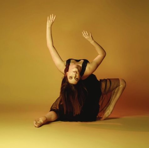 Alexandra Spoelker does a dramatic pose to show her personality in dance. 
