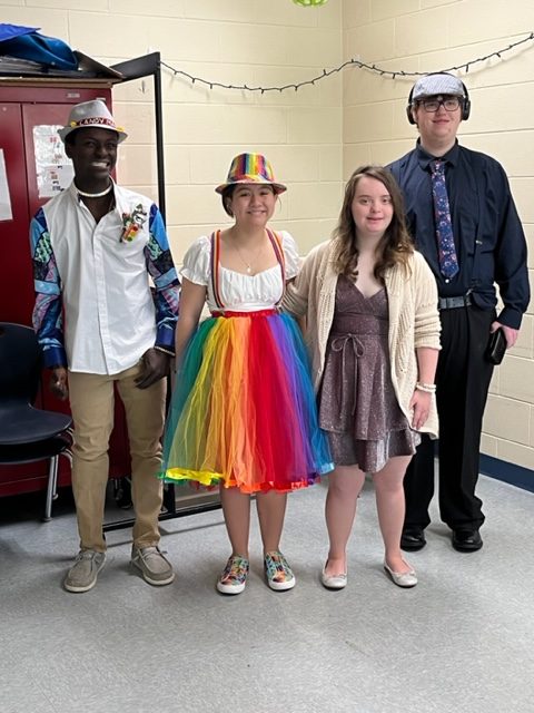 Photo caption: The special education had a daylight prom for the students, Tae Blaich (photo in center) dressed up with them. 