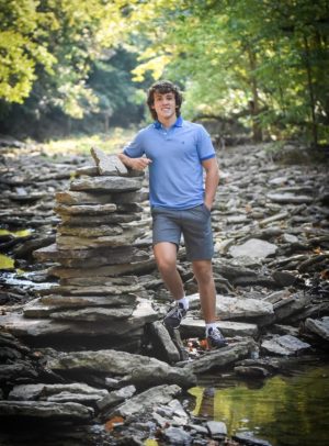  In the water, Zach Simonson taking senior pictures. Photo Credit Bianca Simonson