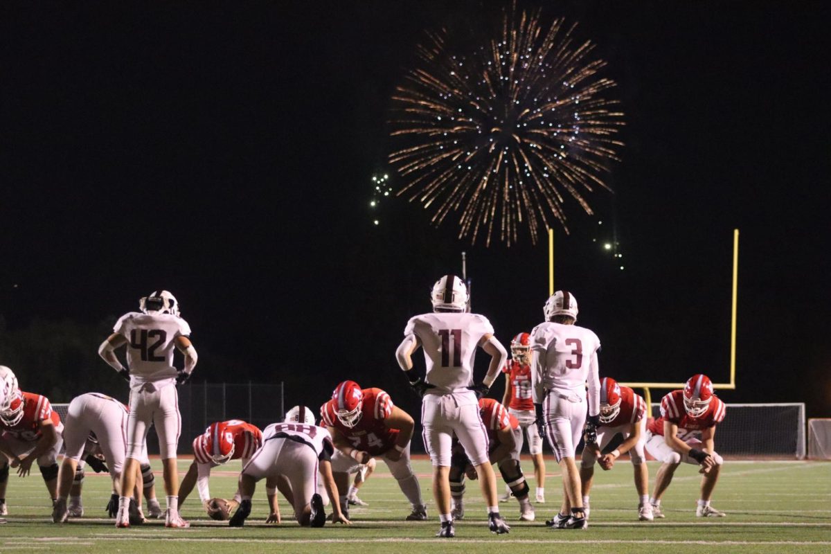 The+Knights+go+to+kick+another+extra+point+against+Turpin+as+the+Kings+Island+Fireworks+go+off.%0A%0APhoto+Credit%3A+Sammie+Moss