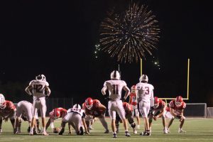 The Knights go to kick another extra point against Turpin as the Kings Island Fireworks go off.

Photo Credit: Sammie Moss